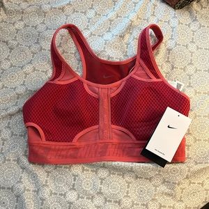 pink nike dry fit sports bra, size medium